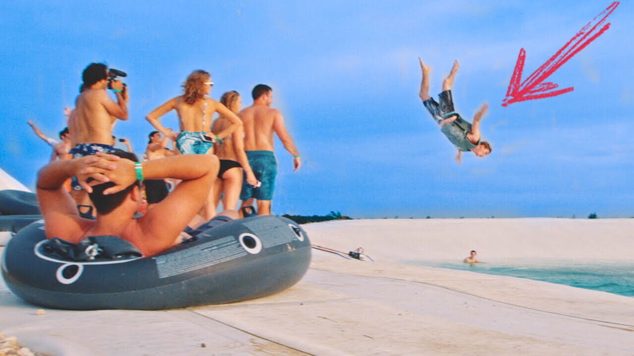 HUMAN SLINGSHOT INTO 1,000,000 GALLON POOL 27 hq720 2554